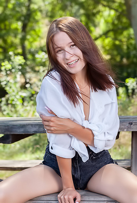 Skye Bloom Perching On A Picnic Table In The Park