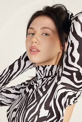 Explore Kris Si Sultry Solo Session With Perky Nipples And Shaved Pussy Teasing On Couch