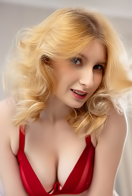Minnie Lighter Teases On The Couch With Seductive Lingerie And Alluring Curves
