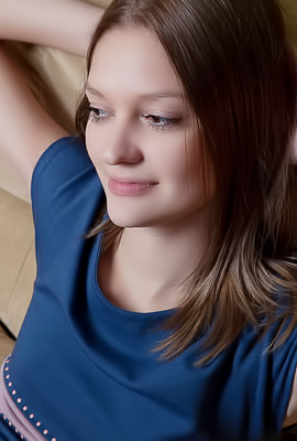 Maye in blue dress teases on couch barefoot with red nails spreading legs for your gaze