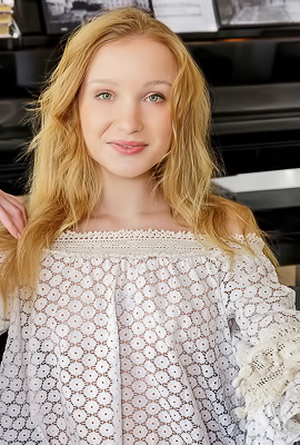 Dana Red With Strawberry-blonde Hair Lounging Naked In An Armchair