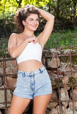 Kassie Performs Out Doorway Striptease In Denim Shorts With Perky Nipples